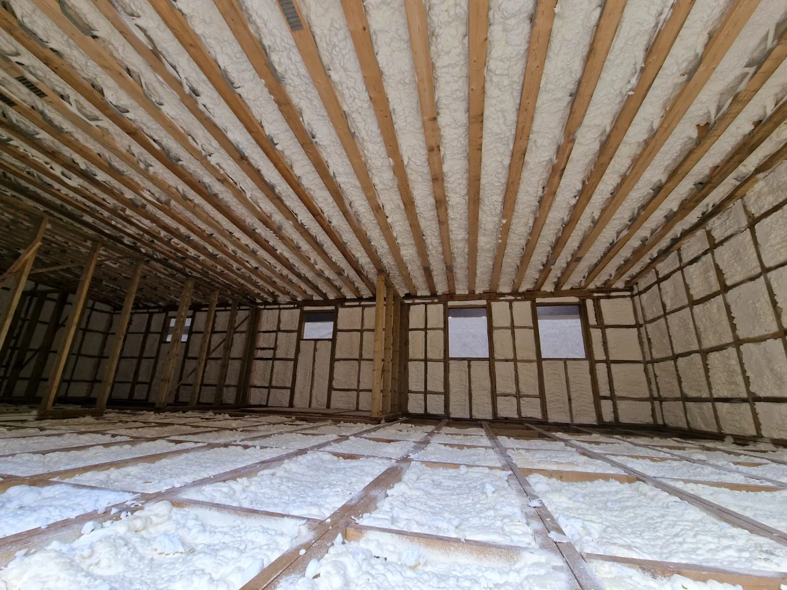 Spray foam applied to a commercial roof
