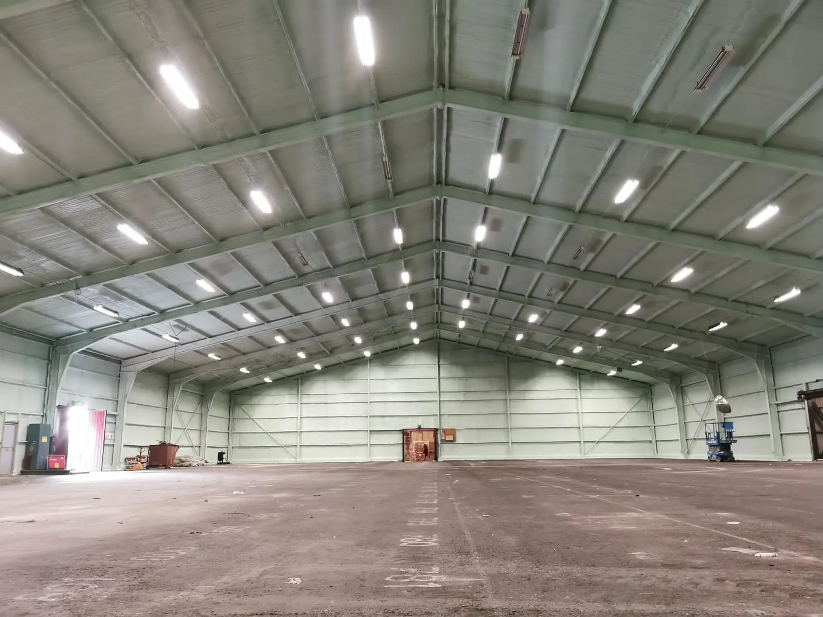 Spray foam insulation applied to asbestos roofs — real Duratite Group project