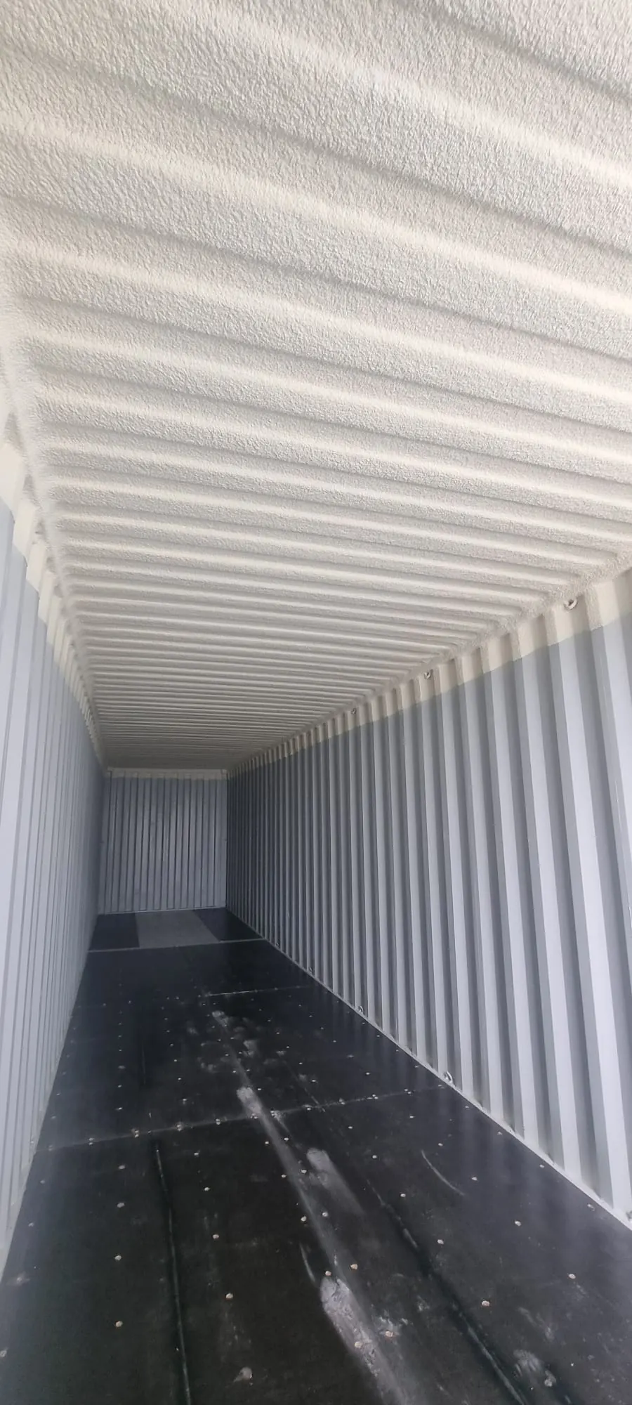 Spray foam insulation applied to modular buildings — real Duratite Group project