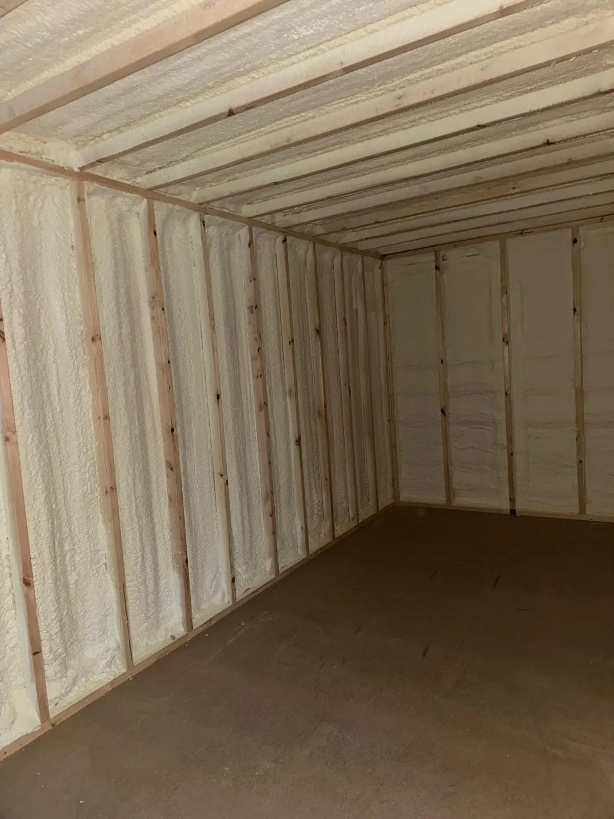 Spray foam insulation applied to shipping containers — real Duratite Group project