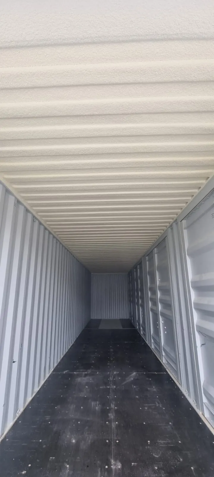 Spray foam insulation applied to modular buildings — real Duratite Group project