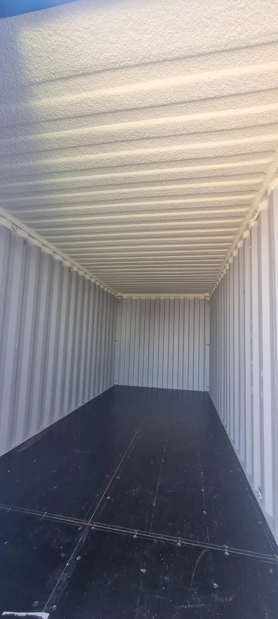 Spray foam insulation applied to modular buildings — real Duratite Group project
