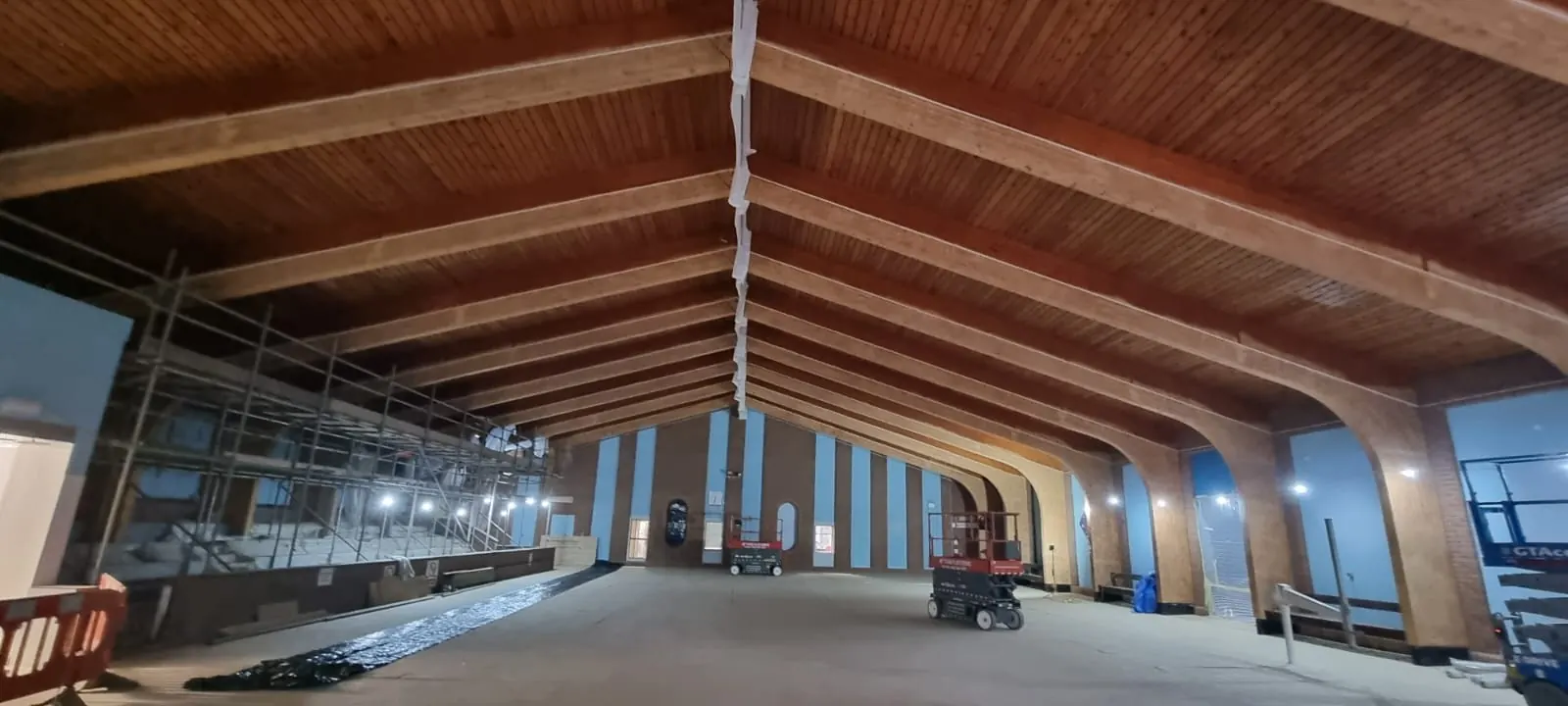 Spray foam insulation applied to pool halls — real Duratite Group project