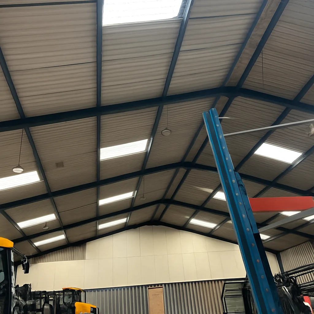 Roof underside before the TJW warehouse insulation project